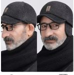 Зимова кепка вушанка